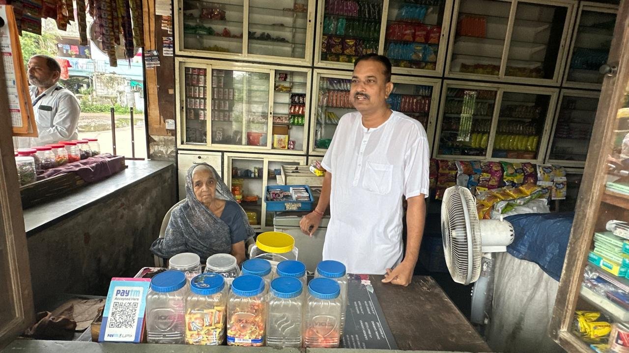 Vikram Singh Parmar with his mother at their grocery shop, near Ahmedabad airport. Vikram Singh Parmar with his mother at their grocery shop, near Ahmedabad airport.